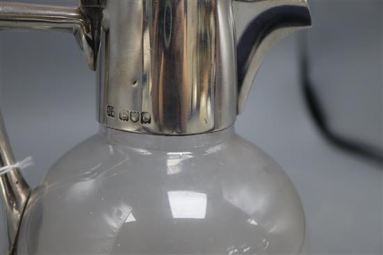 A late Victorian silver mounted glass claret jug by Hukin & Heath, London, 1898, height 19.6cm.